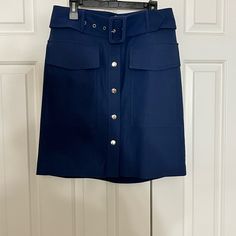 Brand New Women’s Size Small Button Front Skirt With 2 Pockets. Belt Is Removable. 19-Inch Length Smoke Free/Pet Free Home Utility Skirt With Pockets For Work, High Waist Blue Skirt With Belt Loops, High-waist Blue Skirt With Belt Loops, Utility Bottoms With Buttoned Pockets For Work, Button-up Workwear Bottoms With Pockets, Utility Workwear Bottoms With Buttoned Pockets, Casual Blue Belted Skirt, Casual Blue Skirt With Belt Loops, Blue Mini Skirt With Belt Loops