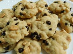 a white plate topped with cookies and chocolate chips