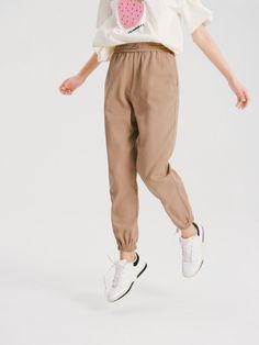 Details: Khaki color casual pants Made of high-count combed cotton, soft and comfortable to the touch Elastic waist, easy to put on and take off Customized embroidery, drawstring leg Materials & Care: Cotton 80.2%, Polyester 19.8% Hand wash | Dry clean Do not bleach Size & Fit: Model is 5'7", Bust 32, Waist 24, Hips 35, wearing a size S Item #: WM2PA07 Brown Cargo Pants With Elastic Waistband For Spring, Spring Brown Cargo Pants With Elastic Waistband, Beige Athleisure Sweatpants With Elastic Waistband, Comfortable Sweatpants With Elastic Cuffs For Spring, Brown Stretch Casual Cargo Pants, Casual Stretch Brown Cargo Pants, Comfortable Spring Sweatpants With Elastic Cuffs, Casual Ankle-length Joggers With Elastic Cuffs, Beige Stretch Sweatpants For Fall