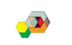 three hexagonal shapes with different colors and sizes on each side, one is yellow, the other is red