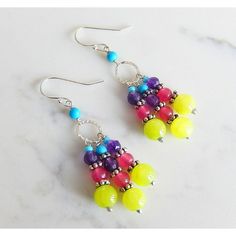 The Boho Chandelier Earrings Are Composed Of A Colorful Array Of Jade Beads, Turquoise Blue Magnesite, Glass Seed Beads And Sterling Silver Components. The Earrings Dangle 1.5in. From The Ear. The Ear Wires Are Sterling Silver. Vibrant Yellow Dangle Earrings, Bohemian Yellow Dangle Chandelier Earrings, Yellow Dangle Chandelier Earrings For Party, Vibrant Yellow Beaded Jewelry, Multicolor Beaded Drop Earrings With Natural Stones, Yellow Dangle Earrings For Jewelry Making, Yellow Chandelier Drop Earrings With Dangling Beads, Multicolor Natural Stones Beaded Drop Earrings, Yellow Chandelier Earrings With Dangling Beads As Gift