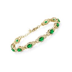 PRICES MAY VARY. Stunning Simulated Emeralds: This tennis bracelet showcases vibrant 6X4MM oval-cut green simulated emerald gemstones with a total carat weight of 8.00 Cttw. The emerald green color exudes elegance and sophistication. High-Quality 18K Yellow Gold Plated Silver: The bracelet is made with top-notch 925 sterling silver and plated with 18K yellow gold, providing a luxurious and radiant finish. Classic Tennis Bracelet Design: The timeless and classic tennis bracelet style features a c Elegant Green Oval Diamond Bracelet, Classic Green Oval Diamond Bracelet, Classic Green Oval Tennis Bracelet, Emerald Tennis Bracelet, Bracelet Style, Bracelet Design, Emerald Gemstone, Gem Stone, Bracelet For Women