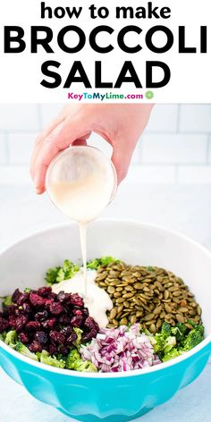 broccoli salad in a bowl with dressing being drizzled over it