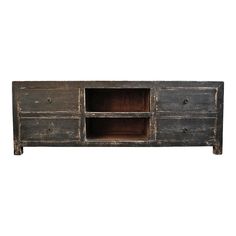 an old wooden sideboard with drawers on one end and two open shelves on the other