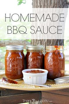 homemade bbq sauce in mason jars on a tray with the words, homemade bbq sauce