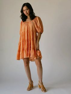 Orange Puff Sleeve Dress For Summer, Orange Puff Sleeve Summer Dress, Summer Orange Puff Sleeve Mini Dress, Spring Orange Mini Dress With Puff Sleeves, Casual Orange Puff Sleeve Dress, Orange Knee-length Mini Dress For Day Out, Short Sleeve Peach Dress For Vacation, Peach Short Sleeve Dress For Vacation, Short Sleeve Peach Vacation Dresses