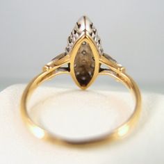 "IMPORTANT: A description is available following the details. Please, read on. Thank you. Material: 18K solid gold, ~21 brilliant cut natural diamonds Size: 6 Weight: 3.1g Period: Mid Century, Retro Style: marquise Origin: France Provenance: an estate sale Condition: excellent vintage, minor wear Addition remarks: stamped with the French owl assay mark to guarantee its 18 carat solid gold content. It has also been professionally tested to be 18-carat solid gold content N.b.: We guarantee the aut Gold Pear-shaped Diamond Ring, Gold Pear-shaped Single Diamond Ring, Gold Pear-shaped Diamond Ring With Single Diamond, Gold Marquise Rings With Single Cut Diamonds, Art Deco Marquise Diamond Cut Ring, Art Deco Marquise Diamond Ring, Hallmarked Yellow Gold Marquise Diamond Ring, Luxury Marquise Gold Diamond Ring, Luxury Gold Marquise Diamond Ring