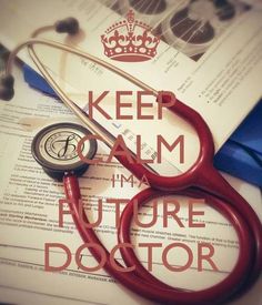 a pair of red scissors sitting on top of an open book with the words keep calm i'm future doctor