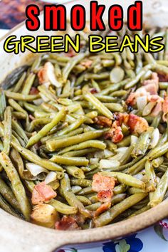 green beans in a bowl with bacon on top and the words smoked green beans above it