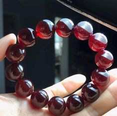 Material:  Garnet beads Size: 15mm Shape: round Quality: A Quantity: 1 strand 6mm approx 29 pcs one strands 7mm approx25 pcs one strands 8mm approx 22 pcs one strands 9mm approx 21pcs one strands 10mm approx 19 pcs one strands 11mm approx 18pcs one strands 12mm approx 16 pcs one strands 13mm approx 16 pcs one strands 14mm approx 15 pcs one strands 15mm approx 14pcs one strands 16mm approx 14 pcs one strands 17mm approx 13pcs one strands 18mm approx 13pcs one strands 19mm approx 12pcs one strands Ruby Beaded Bracelets As A Gift, Ruby Beaded Bracelets With Round Beads For Gift, Ruby Beaded Bracelets With Round Beads As Gift, Burgundy Round Beads Bracelet As Gift, Purple Garnet, Garnet Bead Bracelet, Beads Bracelets, Bracelet Women, Healing Stone