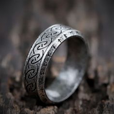 Show your love of Norse mythology with this stainless steel Viking Runes ring. Featuring a stylish, modern design and large engraving of ancient runes, this ring is a must for those who want to pay tribute to their Viking heritage. - 3 Colors availableThis Viking Runes ring is perfect for anyone looking to customize their look with a trendy and high quality ring. Made from premium-quality stainless steel, this gorgeous ring will never tarnish or oxidize thanks to its ridiculous sturdy nature. It Thor Hammer Keychain, Viking Heritage, Nordic Symbols, Teen Ring, Ancient Runes, Nordic Runes, Mjolnir Pendant, Viking Skull, Runic Alphabet