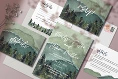 wedding stationery with watercolor trees and mountains