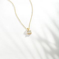 "Remember that diamonds are a girl's best friend when the diamond is too precious to wear. Keep them close, especially around your neck. F E A T U R E S * Made to Order. * Gold KT: 14K * Choice of Gold Color: Yellow Gold, White Gold * Gem Stone: Genuine Diamond * Diamond-Cut: Round * Diamond Carat: 0.18 ct * Pendant Height: 5 mm / 0.19 in * Pendant Width: 5 mm / 0.19 in * Diamond Color-Clarity: H Color, SI Clarity * Length: 14\", 16\", 18\" * Setting Type: Baguette Cut * Ready to Ship in 1-3 Bus