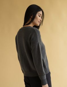 A new take on our cashmere cardigan sweater. 100% Grade A Mongolian cashmere in an oversized boyfriend fit. Features button front & adjustable button sleeve closure. DETAILS FIT: Model is 5'9" and is wearing a size S. FABRIC: 100% cashmere CARE: Hand wash cold with like colors. Lay flat to dry, low iron if needed. Sweater can be washed in a washing machine on delicate style. Lat Flat to dry or machine dry on gentle cycle. Hand washing cashmere can lead to a longer lifecycle. Oversized Gray Cashmere Sweater, Oversized Fine Knit Cashmere Cardigan, Oversized Cashmere Cardigan In Fine Knit, Oversized Cashmere Cardigan With Fine Knit, Relaxed Fit Cashmere Cardigan With Ribbed Cuffs, Relaxed Fit Sweater With Button Cuffs For Fall, Everyday Fall Cashmere V-neck Sweater, Fall Cashmere Sweater With Button Cuffs, Casual Cashmere Sweater With Button Cuffs