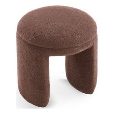 a small stool made out of brown material