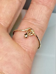 Beautiful coiled up Snake ring a unique and well designed ring would be a great addition to your collection. **Gold: 14k/10k Real Solid Gold **Thickness approx: 1mm Unique Yellow Gold Snake Ring For Promise, 14k Gold Snake Ring Gift, Unique Yellow Gold Snake Ring As Gift, 14k Gold Snake Ring Stamped 14k, Perfect For Gift, Adjustable 14k Gold Snake Ring For Anniversary, 14k Gold Snake Ring Stamped 14k For Gift, Unique Spiral Promise Ring Jewelry, Unique Spiral Promise Ring, Tiny Snake