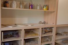 the shelves are filled with craft supplies and other things to make it look like they have been made out of plywood