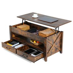 a wooden table with drawers underneath it and a laptop computer on top of the desk