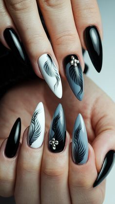 Elevate your nail game with this exquisite monochrome design! Featuring elegant feathers painted in black on a white and gray background, these nails embody sophistication and style. The glossy finish paired with subtle metallic details adds an extra layer of elegance, making them perfect for any occasion. Embrace your inner artist and try this look today!
#winternails #acrylicnails #nailsdesign #nailsinspo #decembernails December Nails, Feather Painting, Monochrome Design, Nail Games, Gray Background, You Nailed It