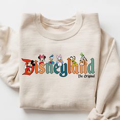 Disneyland The Original Sweatshirt, Magical Land Sweatshirt, Disneyland Shirt, Mickey Minnie Sweatshirt, Family Disneyland Vacation Shirts Gifts For Family By Miosama.  best day ever shirt,  disneyland trip 2024,  disney shirt,  magical kingdom, disneyland sweater,  disneyland tee,  mickey minnie shirt,  retro disney,  disneyland shirt,  retro disneyland,  disneyland tshirt,  mickey sweatshirt,  disney sweatshirt ... Disneyland Sweater, Retro Disneyland, Disneyland Sweatshirt, Disney Magical, Disneyland Shirt, Mickey Sweatshirt, Disney Sweatshirt, Retro Disney, Disneyland Vacation