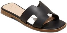 Slide Sandals For Summer Outings, Chic Flat Slides For Summer Outings, Chic Slide Footbed Sandals For The Beach, Black Summer Vacation Mules, Trendy Open Toe Slides For Day Out, Modern Beach Slide Footbed Sandals, Modern Beach Footbed Slide Sandals, Modern Slide Footbed Sandals For Beach, Modern Open Toe Beach Slides