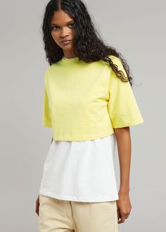 Color: Yellow Cotton jersey Relaxed fit Cropped profile Crew neckline Tonal logo embroidery 100% Cotton Hand Wash Cold By The Frankie Shop. Imported Product Measurements: XS/S- 19" Shoulder, 38" Bust, 14.5" Length M/L- 20" Shoulder, 40" Bust, 15.5" Length Model is 178cm/ 5'10" wearing size XS/S Sporty Cotton Crop Top, Yellow Cropped Cotton Top, Yellow Cotton Short Sleeve Crop Top, Yellow Cotton Crop Top With Short Sleeves, Spring Cotton Crop Top T-shirt, Spring Fitted Cropped T-shirt With Crew Neck, Spring Fitted Crew Neck Cropped T-shirt, Spring Cotton Crew Neck Tops, Fitted Cropped T-shirt With Crew Neck For Spring