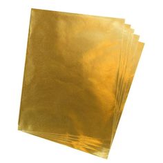 gold foil bags are stacked on top of each other