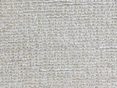 an upholstered fabric textured with white and grey colors, suitable for use as a background or wallpaper