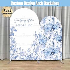 a white and blue floral backdrop with the words custom design arch back drop on it