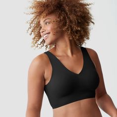 The True Everybody Women's V-Neck Bra offers a smooth, second-skin fit that stays in place no matter how you move. Made of lightweight microfiber with the perfect amount of stretch, this pull-on bra features a low-cut V neckline that stays hidden beneath your favorite tops. Wirefree, and lightly lined with removable pads, it's designed for comfort, all day and everyday. True Everybody by True & Co: We make bras that feel good. Black V-neck Activewear, Black V-neck Activewear With Built-in Bra, Black Seamless Second-skin Activewear, Black Fitted V-neck Activewear, Seamless High Stretch V-neck Activewear, Seamless High-stretch V-neck Activewear, Solid Seamless V-neck Activewear, Black Micro-elastic Soft Touch Shapewear, Most Comfortable Bra