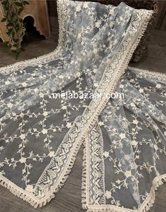 Lightweight gray net dupatta with off white embroidery jaal. Silver Lace For Dupatta, Luxury Elegant Gray Dupatta, Silver Sheer Dupatta For Wedding, Traditional Gray Dupatta, Elegant Semi-stitched Gray Dupatta, Net Dupatta, White Embroidery, Scarf Wrap, Light Grey