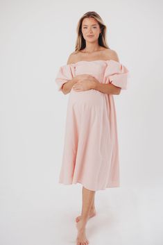 The Hamilton is everything you're looking for in a midi dress - charming, sophisticated, and absolutely flattering. It features premium quality details, like a sweetheart neckline and gorgeous balloon sleeves that can be worn on or off the shoulder. It's an unforgettable choice for every body type, and extra-comfy for expecting mamas! The best part? You can wear this beauty long after your sweet baby arrives! Available in multiple colorways. FIT: Runs true to size. Features a smocked back panel for comfort. This dress is roomy in the waist and will accommodate early maternity in your true size, but consider sizing up if you are in advanced pregnancy. MATERIAL: GARMENT DETAILS: Empire-waisted midi dress, with sweetheart neckline and statement balloon sleeves that can be worn on or off the s Chic Pink Puff Sleeve Dress With Elastic Sleeves, Pink Puff Sleeve Dress With Elastic Sleeves For Brunch, Feminine Knee-length Puff Sleeve Dress With Elastic Sleeves, Pink Balloon Sleeve Dresses With Elastic Sleeves, Feminine Off-shoulder Dress With Fitted Bodice, Chic Ruched Dress With Balloon Sleeves, Elegant Pink Dress With Elastic Sleeves, Spring Midi Dress With Balloon Sleeves And Ruched Detail, Flowy Dresses With Elastic Sleeves For Brunch