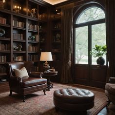 a living room filled with lots of bookshelves next to a chair and ottoman