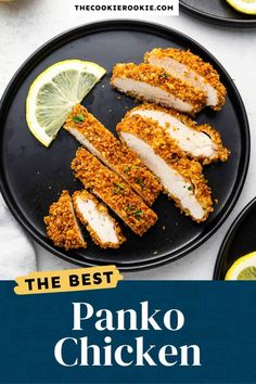 the best panko chicken recipe on a black plate with lemons and lime slices