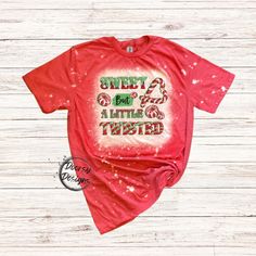 a t - shirt that says sweet as a little twisted on it