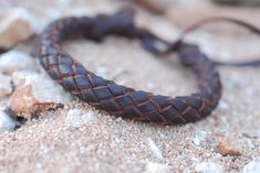 "8 BRAID LEATHER BRACELET - HANDMADE Made with eight leather strips, this braided \"wheel\" is full of difficulties and beauty. Leather bracelet with a round shape where all the threads intersect, this model is made without body. Without central part, only the strength of the fingers gives resistance to the bracelet. Impressive piece of craftsmanship for its work and its size. ✔ 100% Handmade ✔ Water resistant Bracelet diameter: 1.1 cm / 0.43 In. WRIST MEASUREMENT: To find out the size of your w Handmade Leather Braided Bracelet, Bohemian Braided Leather Bracelets, Bohemian Braided Leather Bracelet, Leather Bracelet For Men, Handmade Leather Bracelets, Braided Leather Bracelet, Bracelet For Men, Braided Bracelets, Bracelet Handmade