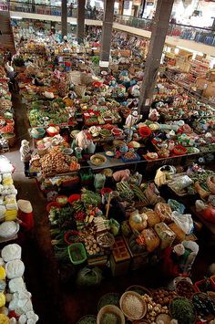 an indoor market filled with lots of food