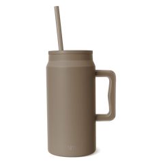 a cup with a straw sticking out of it