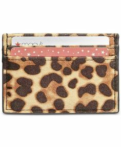 an animal print card case with a credit card holder