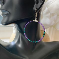 This Beautiful Combination Of Purple And Teal With Navy Blue Fire Polished Czech Beads Is Sure To Become A Favourite Accessory. Lightweight, Comfortable To Wear And Hypoallergenic. Width Is Approx. 1.5” Length Is Approx. 2.5” Purple Festival Jewelry With Ear Wire, Purple Beaded Jewelry For Festivals, Purple Beaded Earrings With Round Beads For Festival, Purple Round Beaded Earrings With Ear Wire, Adjustable Purple Beaded Earrings With Colorful Beads, Purple Beaded Earrings With Colorful Beads, Purple Hoop Earrings As Gift, Purple Tiny Beads Party Jewelry, Festival Purple Beaded Earrings With Round Beads