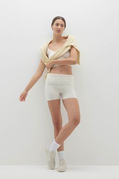 The Neela shorts are made from 100% cashmere, they feature a chic foldover design and ribbed details. Perfectly paired with the Lexie, these shorts are a stylish and cozy must-have. 145 grams of 100% pure cashmere in 12-gauge knit Foldover short Ribbed trim Elastic waist 18 1/4" total length, 9 1/2" rise, 3" inseam (size small) Dry Clean Only Ecru Color, 12 Gauge, Summer Blue, Mens Outerwear, Shopping Cart, Chic Outfits, Jumpsuit Dress, Sweater Top, Sweater Cardigan