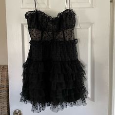 This Is Still Full Price On The Website! Black Color Is Sold Out & Hard To Find!! Now This Is True Love. Super Feminine Lace Mini Dress Featuring Flocked Dot Ruffled Tulle And A Sweetheart Neckline. Skirt Is Tutu-Style With Contrast Velvet Detailing And Adjustable Shoulder Straps. For Love & Lemons Runs Small As A Brand. So Size Large Is More Your Typical Medium. For Love & Lemons A-Line Dress Lace Flocked Dot Ruffle Tulle Flocked Dot Detail Sweetheart Neckline Tutu Skirt Contrast Velvet Taping Black Mini Dress With Ruffled Straps For Party, Black Flirty Dress With Ruffled Straps, Black Dress With Ruffled Straps, Flirty Black Dress With Ruffled Straps, Black Mini Dress With Sweetheart Neckline And Ruffles, Black Dress With Ruffled Straps For Night Out, Black Strapless Dress With Ruffle Hem, Black Dress With Ruffles And Sweetheart Neckline, Black Sweetheart Neckline Dress With Ruffles