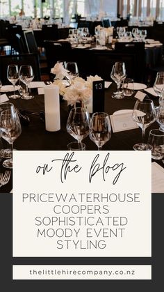 a black table with white flowers and wine glasses on it is featured in the article on the blog pricewaterhouse sophisicated mody event styling