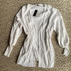 Nwt Really Soft And Versatile Ribbed White Open Cardigan From Afrm. This Can Be Worn Over Just About Anything- Jeans, Scrubs, Dresses, Workout Clothes, Leggings. You Can’t Go Wrong With This. The Sleeves Are Fitted At The Wrist For A More Polished Look. Size Is Xs/S Bc Of The Open Fit & Stretch (Could Fit A M As Well). Hits Past The Hip. This Is A Staple Piece You’ll Reach For Over & Over! Would Also Make A Great Gift. New To Poshmark? Sign Up With Code “Gracebgreene” For $10 Off Your First Purc Fitted Open Front Sweater For Daywear, White V-neck Outerwear For Layering, White Stretch Cardigan For Layering, White Open Front Tops For Fall, White Open Front Top For Fall, White Ribbed Casual Cardigan, Casual White Ribbed Cardigan, Fitted Knit Open Front Top, White V-neck Sweater For Daywear