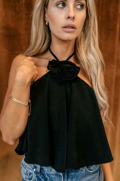 #html-body [data-pb-style=X1UBL6V]{justify-content:flex-start;display:flex;flex-direction:column;background-position:left top;background-size:cover;background-repeat:no-repeat;background-attachment:scroll} The Priscilla Black Rose Detail Halter Top features black lightweight fabric, black lining, a cropped waist, a halter strap tie neckline, and a dramatic black rosette detail. Content & Care • Self: 100% Polyester; Lining: 100% Polyester • Hand wash cold Size & Fit The model is 5'8" and wearing Rosé Details, Halter Tank, Halter Strap, Top Background, Cover Background, Fabric Black, Black Rose, Halter Neck, Lightweight Fabric