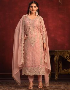 Experience tradition with our Traditional Party Wear Viscose Organza Salwar Suit in Brownish Pink! 🌸 This outfit features a straight-cut pant in viscose organza, exuding elegance and sophistication. Make a chic statement with this traditional ensemble. 💃 #ArabicAttire #PartyWear #ViscoseOrganza Festive Peach Unstitched Suit With Resham Embroidery, Pink Georgette Churidar With Intricate Embroidery, Elegant Embroidered Peach Salwar Kameez, Peach Sets With Dabka Work For Diwali, Peach Embroidered Semi-stitched Salwar Kameez, Semi-stitched Embroidered Peach Salwar Kameez, Festive Anarkali Unstitched Suit In Peach, Pink Churidar With Intricate Embroidery And Long Sleeve, Festive Peach Anarkali Unstitched Suit