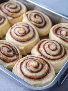 cinnamon rolls in a baking pan ready to be baked