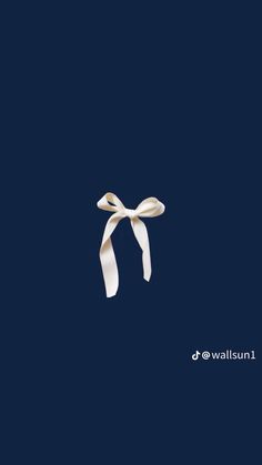 an image of a white bow on a dark blue background with the words walistunu