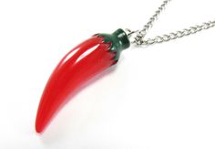 "Pendant Featured: Red Hot Chili Pepper Pendant, Red and Dark Green, Resin Pendant, 1-7/8\" x 1/2\" Necklace Featured: Flat Link Chain, 4 x 3mm, Antique Silver Tone, Lobster Clasp Vintage Iron Twist Curb Chain, 4.6 x 3.3 x 0.6mm, Antique Silver Tone, Lobster Clasp Ball Chain, 2.4mm, Antique Silver Tone, Ball Connector Black or Brown Waxen Cord 2mm, Lobster Clasp Black or Brown Suede Leather Cord 3x1.5mm, Lobster Clasp Gold Tone Plated Flat Link Chain, 4mm x 3mm x 0.8mm, Lobster Clasp Gold Tone P Red Novelty Jewelry For Christmas, Novelty Red Christmas Jewelry, Red Novelty Christmas Jewelry, Red Christmas Novelty Jewelry, Novelty Red Jewelry For Gifts, Red Novelty Jewelry As Gift, Novelty Red Jewelry Gift, Red Novelty Jewelry For Gift, 2 Necklace