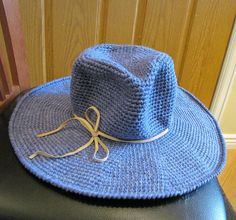 "Handmade Women Crochet Summer Hat Fedora-Style Blue - Hawaiian Ocean Wide Brim Bucket Hat. Softness, Lightweight, packable. Made of soft yarn ( 70% polyester, 30% viscose ) Wire Rope ( enhanced rust protection ) at edge of brim. 1 leather strap, 2 braided yarns ( blue / soft pink )  -  tie around bucket of the hat or pull it down and tie under your chin. Approximately measurements : circumference     23\" crown height     4\" brim wide     5\" Hand Wash then allow it to naturally dry, Do not ir Lightweight Blue Straw Hat With Curved Brim, Lightweight Blue Wide Brim Straw Hat, Blue Lightweight Wide Brim Straw Hat, Blue Wide Brim Straw Hat For Travel, Blue Wide Brim Sun Hat One Size, Blue Wide Brim Crochet Hat For Vacation, Blue Adjustable Crochet Hat With Short Brim, Adjustable Blue Crochet Hat With Short Brim, Blue Wide Brim Woven Sun Hat